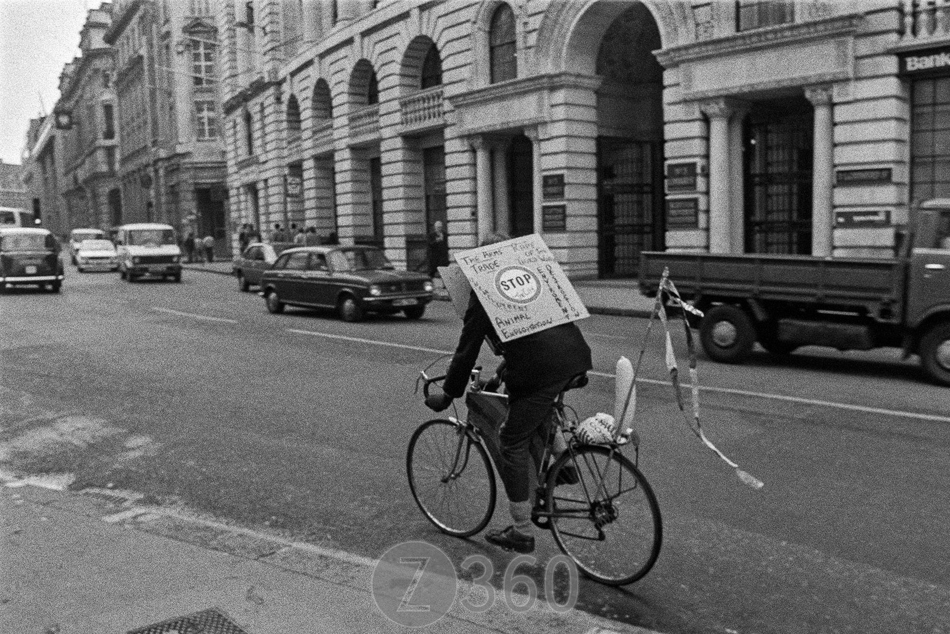 Protestor on a bike